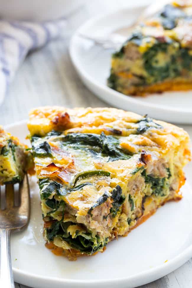 This sausage, leek and spinach quiche is packed with all your favorites for tons of flavor!   It starts with an easy sweet potato crust that's topped with savory sausage, leeks and spinach in a creamy dairy-free egg mixture, then baked to perfection.  Great for brunches or as a make-ahead breakfast, this quiche is Paleo and Whole30 compliant too! 