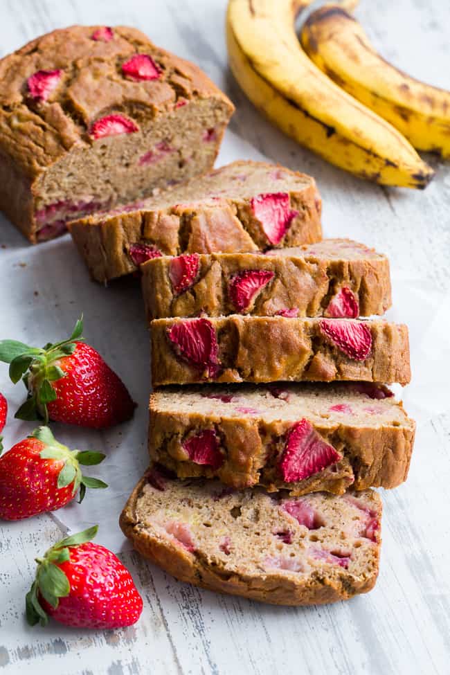 Strawberry Banana Bread that's hearty and soft with just enough sweetness, made both Paleo and nut free thanks to cassava flour!   The strawberries add sweet berry flavor without overwhelming the bread, making it perfect to go with breakfast or as a grab and go snack!  Gluten-free, dairy-free, grain free, paleo. 