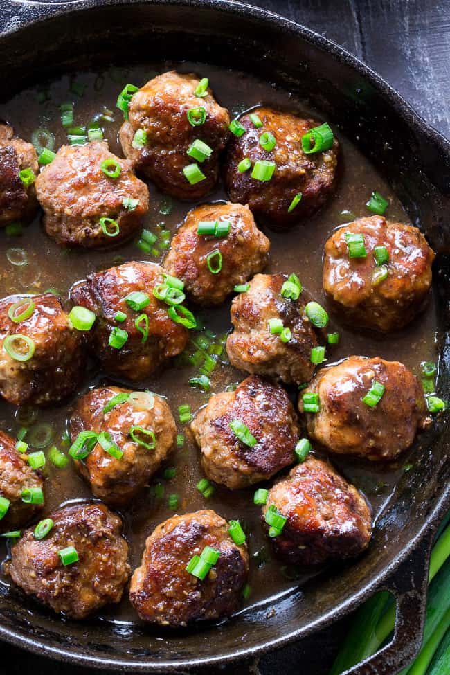 These easy one-skillet teriyaki meatballs are perfect for weeknights, packed with flavor and kid approved!  The sauce is sweetened with dates, so they're paleo and Whole30 compliant, with no added sugar.  Perfect over cauliflower rice or with a side of roasted broccoli!