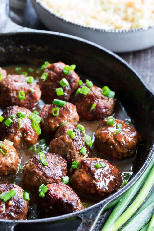 These easy one-skillet teriyaki meatballs are perfect for weeknights, packed with flavor and kid approved!  The sauce is sweetened with dates, so they're paleo and Whole30 compliant, with no added sugar.  Perfect over cauliflower rice or with a side of roasted broccoli!