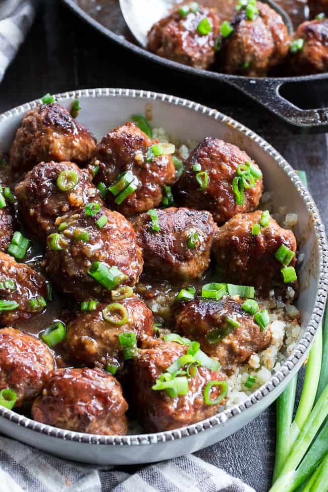 These easy one-skillet teriyaki meatballs are perfect for weeknights, packed with flavor and kid approved!  The sauce is sweetened with dates, so they're paleo and Whole30 compliant, with no added sugar.  Perfect over cauliflower rice or with a side of roasted broccoli!