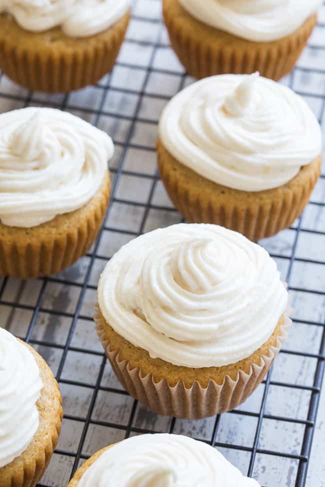 These paleo vanilla cupcakes are so light, fluffy, moist, and sweet that you'd never guess they're gluten free, dairy free and paleo!  The "buttercream" frosting is easy to whip up, and tastes just like the original even though it contains no refined sugar or dairy.  Kid approved and perfect for birthdays, special events, or "just because"!