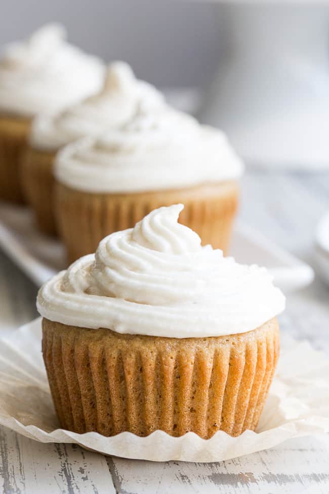 These paleo vanilla cupcakes are so light, fluffy, moist, and sweet that you'd never guess they're gluten free, dairy free and paleo!  The "buttercream" frosting is easy to whip up, and tastes just like the original even though it contains no refined sugar or dairy.  Kid approved and perfect for birthdays, special events, or "just because"!