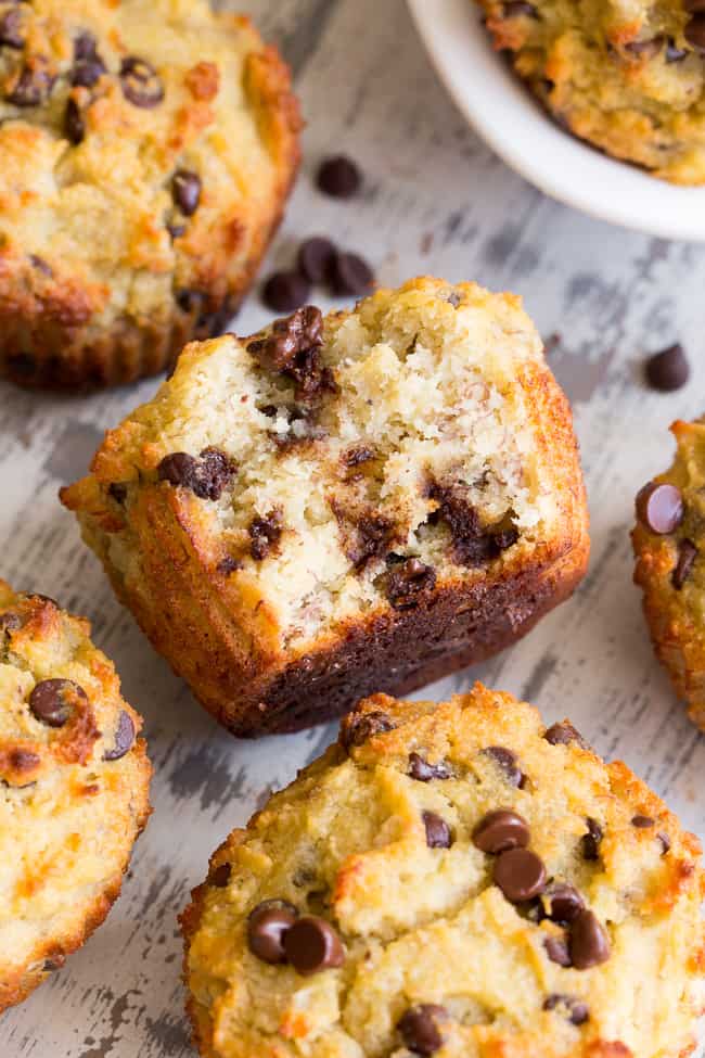 These moist and hearty chocolate chip banana muffins have perfect flavor and texture, PLUS are made nut-free thanks to coconut butter!  These kid friendly, easy-to-make paleo muffins will become a go-to recipe in your house since they're perfect for breakfast, snack and dessert!