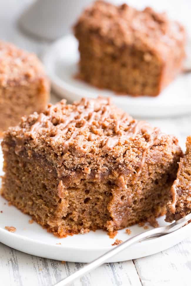 This classic cinnamon coffee cake has it all - a deliciously light, sweet, moist cake topped with loads of cinnamon crumbs and even an optional cinnamon icing!  It's paleo, gluten-free, dairy-free, kid approved and perfect for brunches, snacks and dessert.