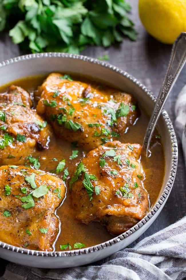 This paleo honey mustard chicken comes together in just 30 minutes in the Instant Pot!  Skin-on chicken thighs are perfectly cooked in a sauce that's packed with tons of sweet tangy flavor.  There's even a Whole30 friendly option using dates instead of honey to sweeten the sauce!  Family approved and sure to become a dinner favorite.