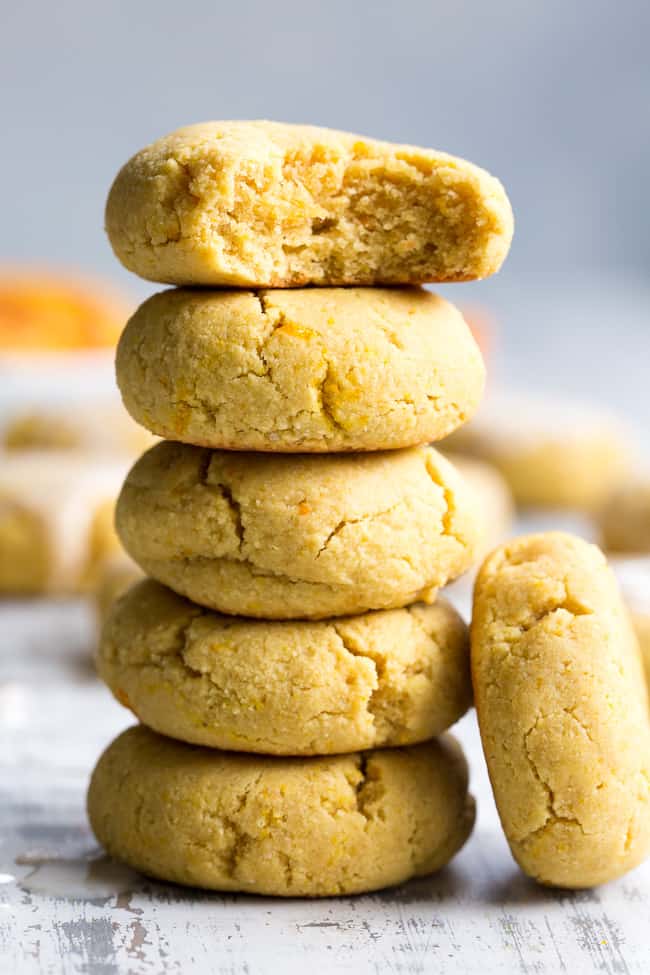 These paleo orange coconut butter cookies have a soft shortbread-like texture and tons of sweet citrus flavor!   They're made with coconut butter and coconut flour, so they're grain free, gluten free, dairy free and nut free.  These addicting cookies are kid approved and delicious with a coconut maple icing!