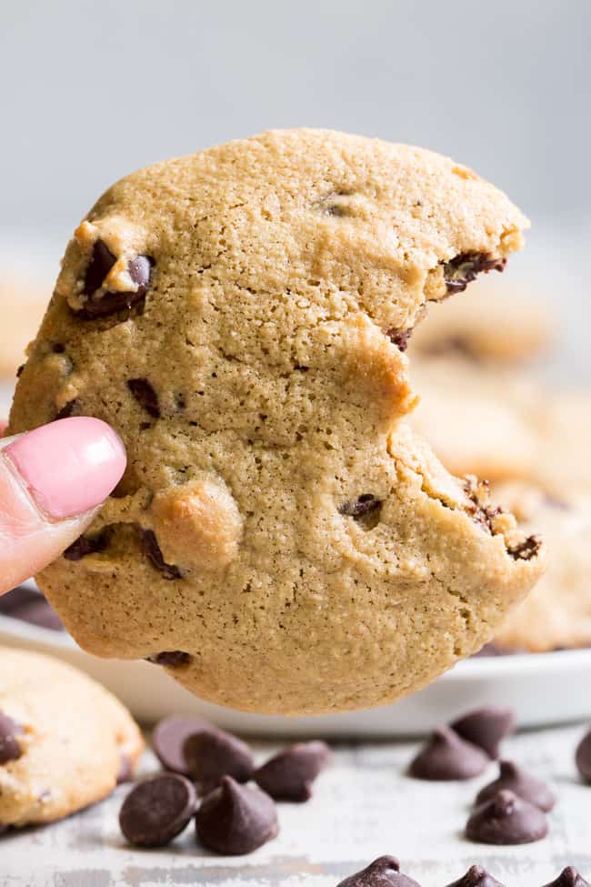 These big soft paleo chocolate chip cookies have the perfect chewy texture with a great nutty flavor thanks to tahini.  They're dairy-free, gluten-free, grain free and nut free as well.  Perfect for snacks and desserts, these cookies are thick and decadent yet healthy!