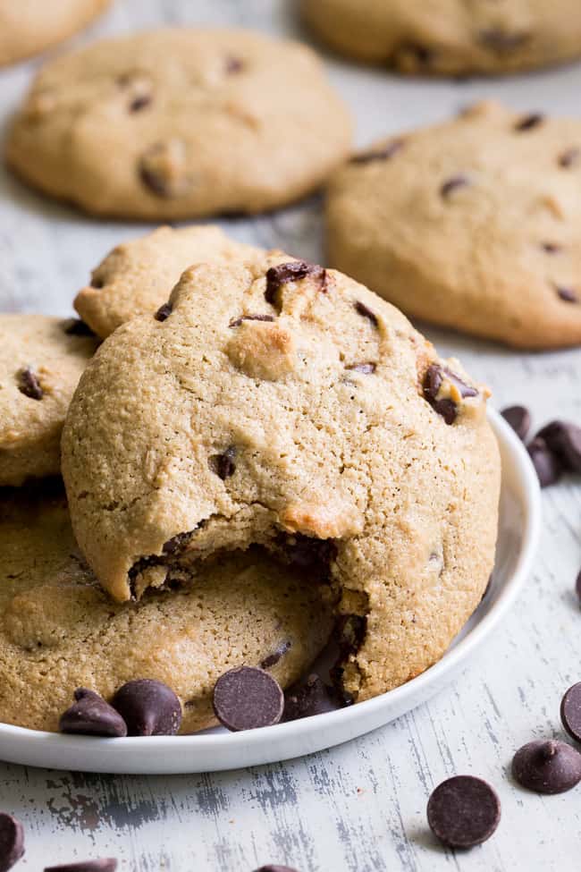 These big soft paleo chocolate chip cookies have the perfect chewy texture with a great nutty flavor thanks to tahini.  They're dairy-free, gluten-free, grain free and nut free as well.  Perfect for snacks and desserts, these cookies are thick and decadent yet healthy!