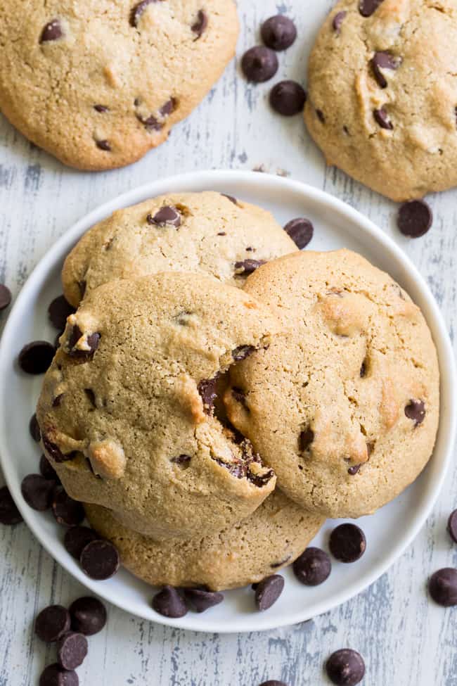 These big soft paleo chocolate chip cookies have the perfect chewy texture with a great nutty flavor thanks to tahini.  They're dairy-free, gluten-free, grain free and nut free as well.  Perfect for snacks and desserts, these cookies are thick and decadent yet healthy!