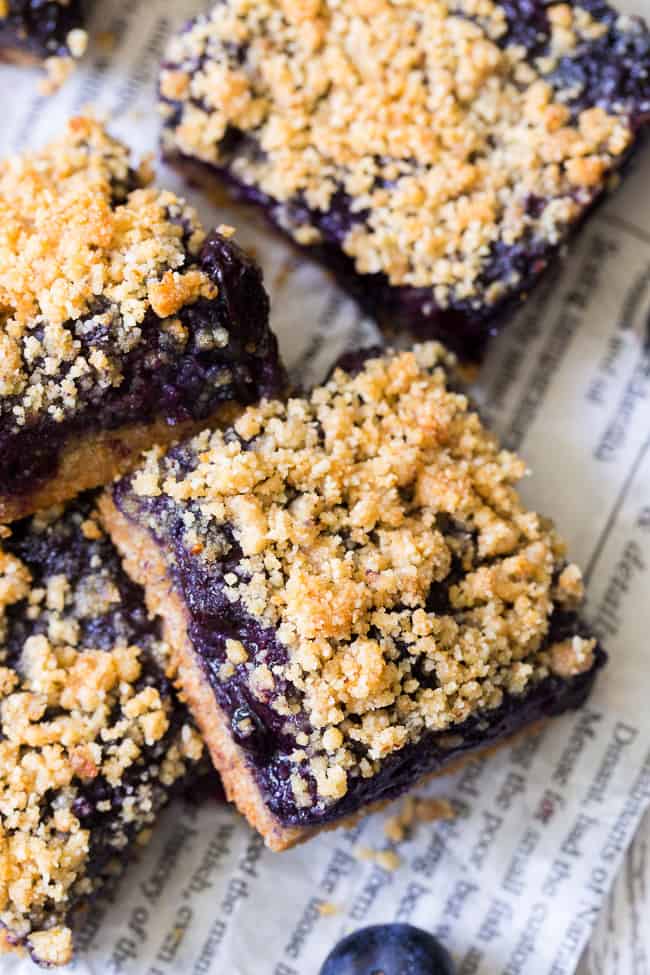 These paleo and vegan blueberry crumb bars are gooey sweet and totally addicting! They’re a great treat to have around for a heathy snack or dessert. Easy to make, gluten-free, grain free, vegan, and total comfort food!