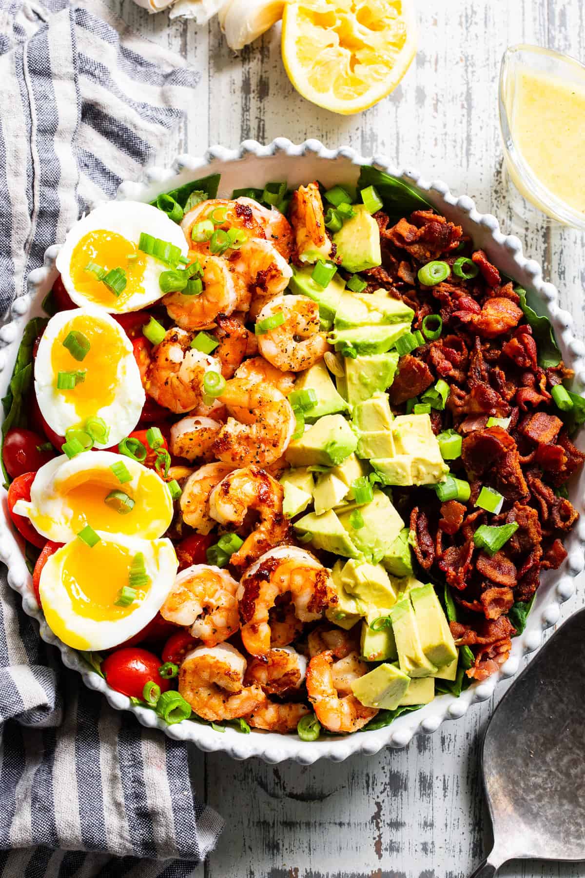shrimp cobb salad with avocado bacon eggs and grilled shrimp