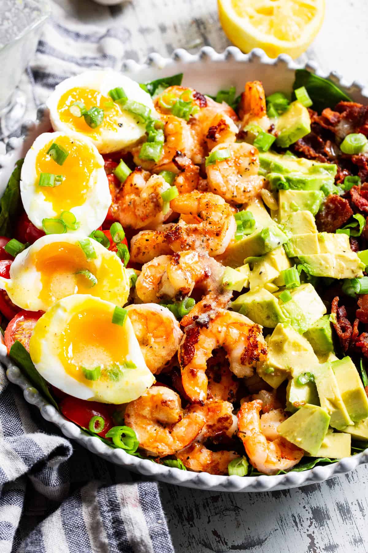 shrimp cobb salad with avocado bacon eggs and grilled shrimp
