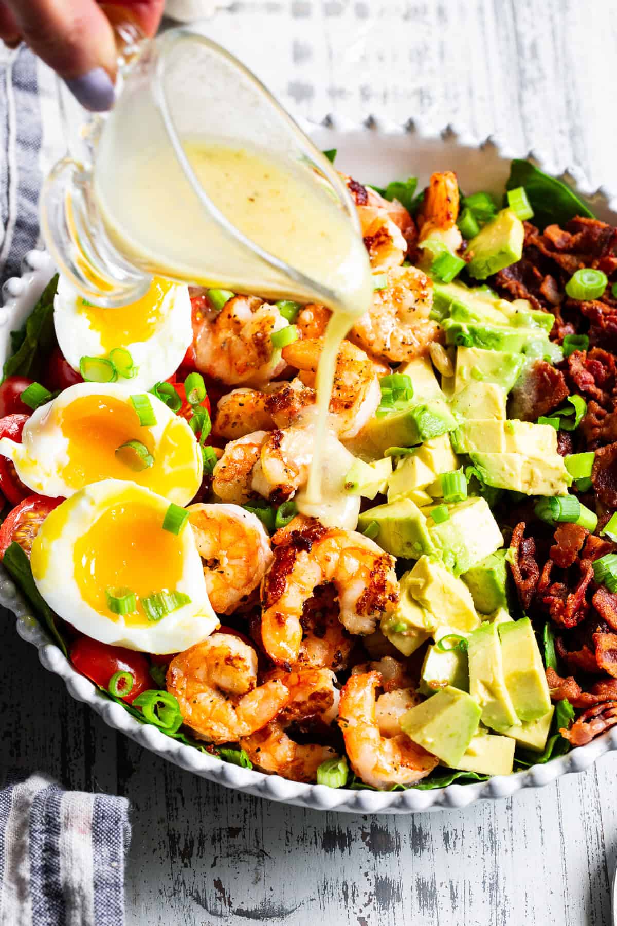 shrimp cobb salad with avocado bacon eggs and grilled shrimp