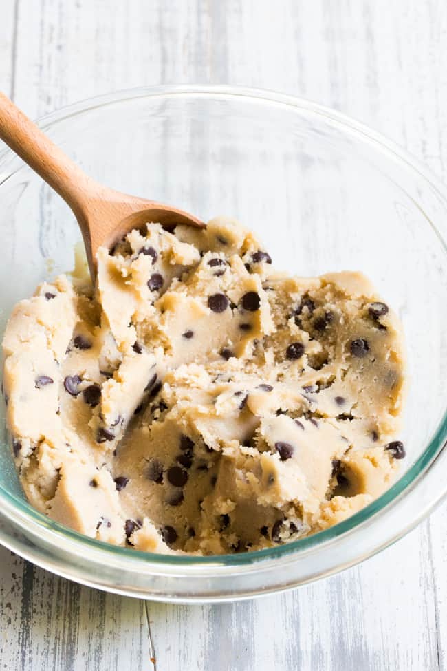 After many taste tests I've come up with the best paleo edible cookie dough recipe that also happens to be vegan!  It's a family favorite, takes just 5 minutes, and can be rolled into cookie dough balls if desired.  Gluten-free, dairy-free, paleo and vegan. 