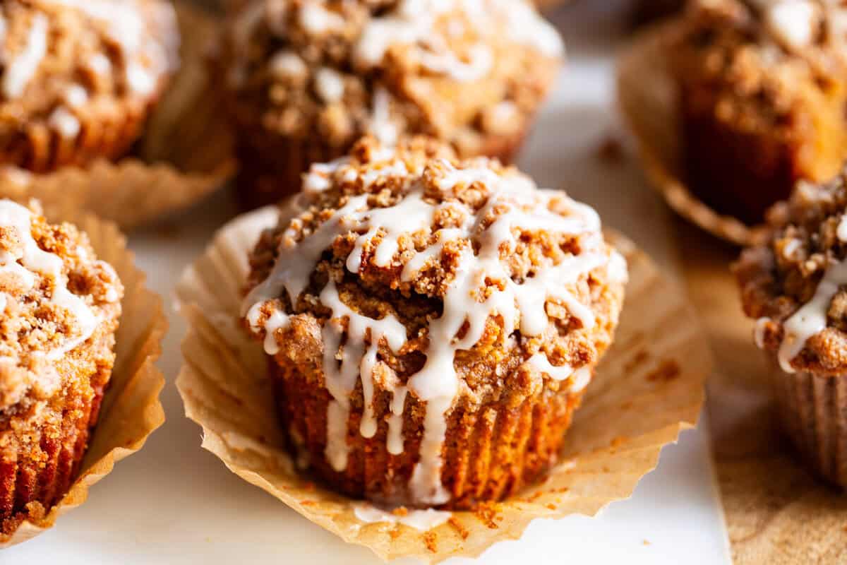 Almond flour pumpkin muffins topped with cinnamon streusel