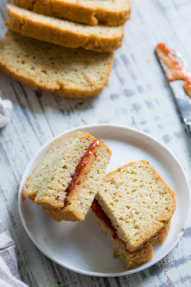 This paleo sandwich bread is easy to make, fluffy, light, and perfect for any type of sandwich!  You can toast in and make breakfast sandwiches, have a BLT or top with almond butter, fruit preserves and bananas for a healthy grain free and paleo treat.