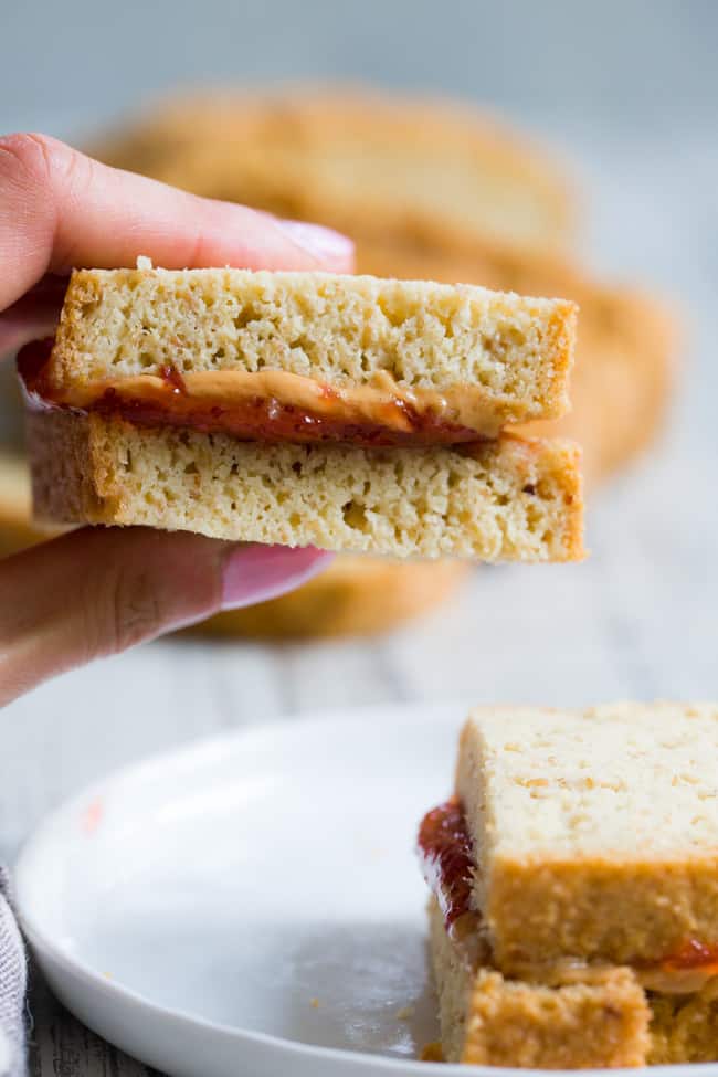 This paleo sandwich bread is easy to make, fluffy, light, and perfect for any type of sandwich!  You can toast in and make breakfast sandwiches, have a BLT or top with almond butter, fruit preserves and bananas for a healthy grain free and paleo treat.