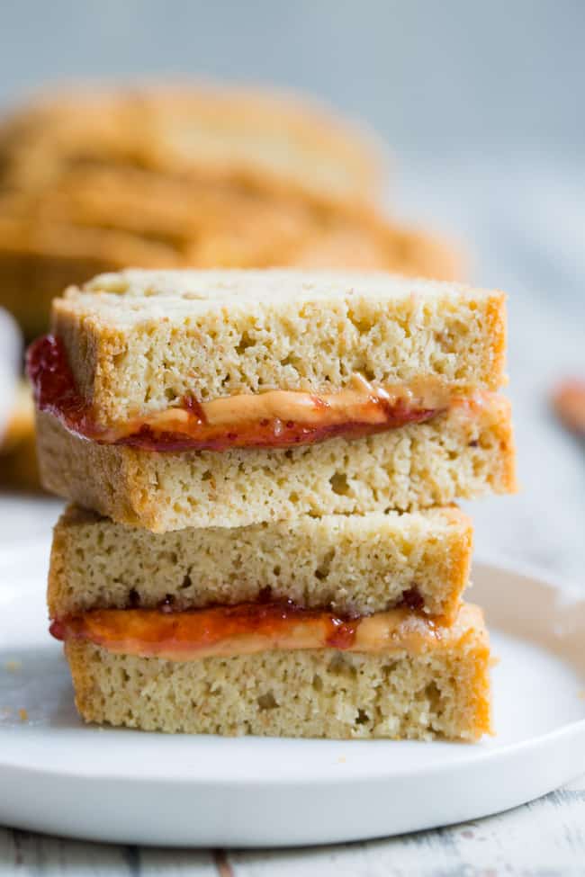 This paleo sandwich bread is easy to make, fluffy, light, and perfect for any type of sandwich!  You can toast in and make breakfast sandwiches, have a BLT or top with almond butter, fruit preserves and bananas for a healthy grain free and paleo treat.