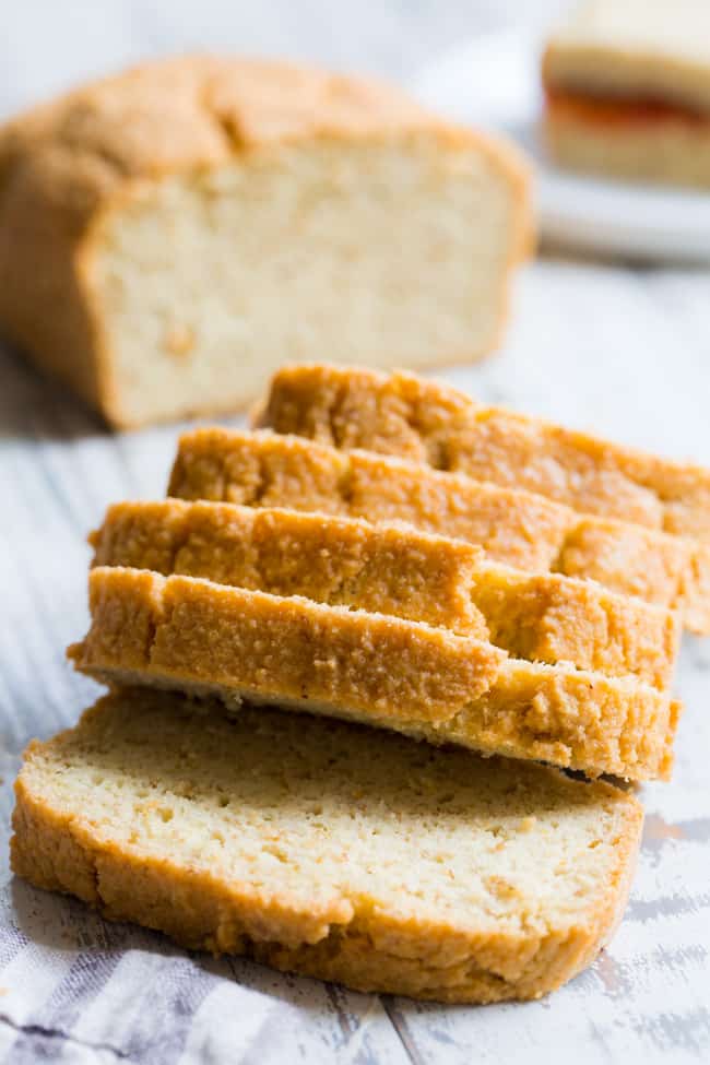 This paleo sandwich bread is easy to make, fluffy, light, and perfect for any type of sandwich!  You can toast in and make breakfast sandwiches, have a BLT or top with almond butter, fruit preserves and bananas for a healthy grain free and paleo treat.