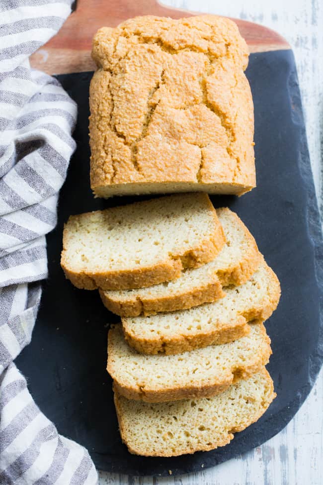 This paleo sandwich bread is easy to make, fluffy, light, and perfect for any type of sandwich!  You can toast in and make breakfast sandwiches, have a BLT or top with almond butter, fruit preserves and bananas for a healthy grain free and paleo treat.