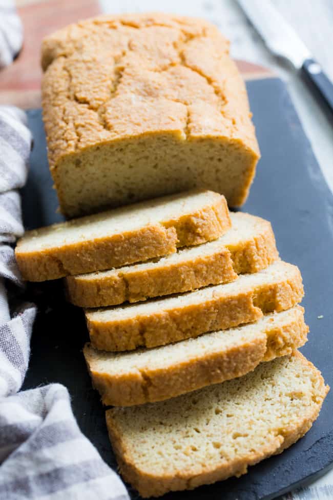 This paleo sandwich bread is easy to make, fluffy, light, and perfect for any type of sandwich!  You can toast in and make breakfast sandwiches, have a BLT or top with almond butter, fruit preserves and bananas for a healthy grain free and paleo treat.