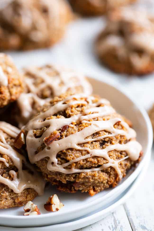 These soft and chewy cinnamon apple pecan cookies have it all!  Gluten-free, paleo, and vegan cookies packed with warm spices, chewy dried apples and chopped pecans in every bite!  They're kid approved, fun to make and make an incredibly tasty fall dessert!