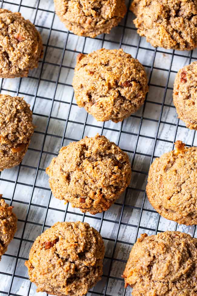 These soft and chewy cinnamon apple pecan cookies have it all!  Gluten-free, paleo, and vegan cookies packed with warm spices, chewy dried apples and chopped pecans in every bite!  They're kid approved, fun to make and make an incredibly tasty fall dessert!