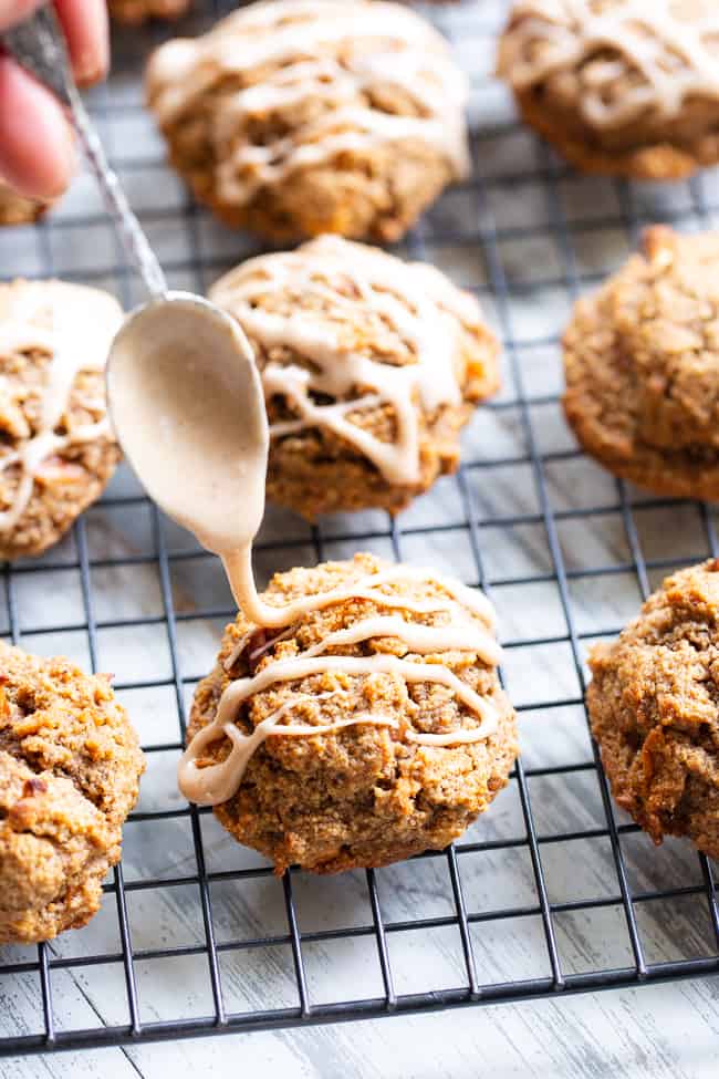 These soft and chewy cinnamon apple pecan cookies have it all!  Gluten-free, paleo, and vegan cookies packed with warm spices, chewy dried apples and chopped pecans in every bite!  They're kid approved, fun to make and make an incredibly tasty fall dessert!