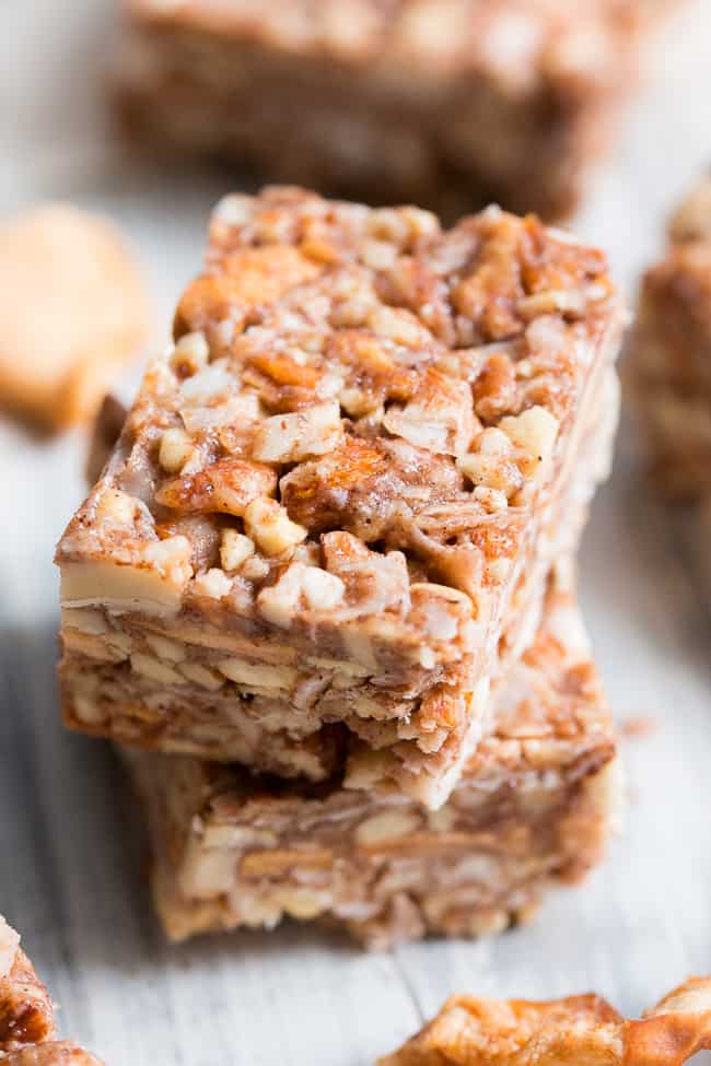 These grain free, vegan, and paleo granola bars are packed with warm spices and chopped dried apples for a fun fall touch!  They're sweetened with pure maple syrup and contain no refined sugar, grains or dairy.  They're chewy, crunchy, family approved and perfect for after school snacks!