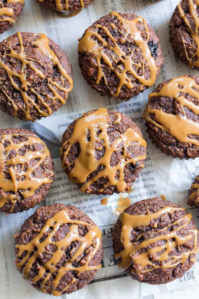 These Pumpkin Spice Latte Muffins have everything you love about your favorite fall drink, in muffin form!  Fluffy, moist muffins packed with pumpkin pie spice and espresso powder drizzled with a dairy-free “latte” icing.  They’re gluten-free, dairy free, paleo, and one of my favorite baking recipes this fall!   Paleo dessert. Paleo pumpkin recipes. Paleo baking. Paleo pumpkin muffins. Pumpkin muffins. Gluten free pumpkin muffins. Healthy pumpkin muffins.