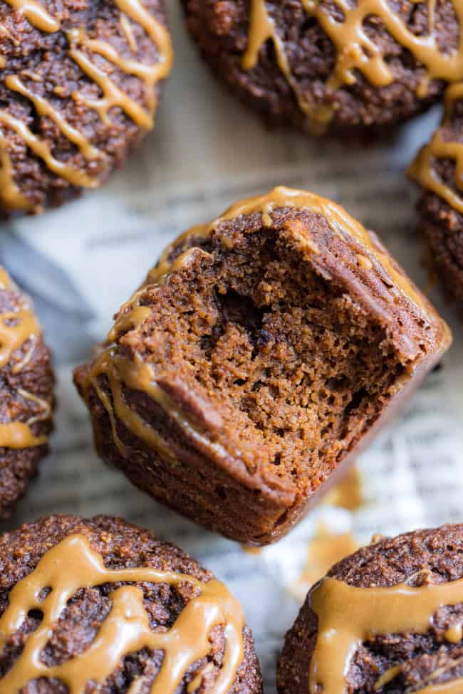 These Pumpkin Spice Latte Muffins have everything you love about your favorite fall drink, in muffin form!  Fluffy, moist muffins packed with pumpkin pie spice and espresso powder drizzled with a dairy-free “latte” icing.  They’re gluten-free, dairy free, paleo, and one of my favorite baking recipes this fall!   Paleo dessert. Paleo pumpkin recipes. Paleo baking. Paleo pumpkin muffins. Pumpkin muffins. Gluten free pumpkin muffins. Healthy pumpkin muffins.