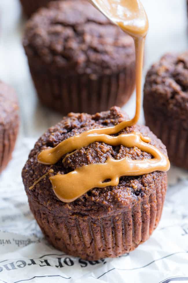 These Pumpkin Spice Latte Muffins have everything you love about your favorite fall drink, in muffin form!  Fluffy, moist muffins packed with pumpkin pie spice and espresso powder drizzled with a dairy-free “latte” icing.  They’re gluten-free, dairy free, paleo, and one of my favorite baking recipes this fall!   Paleo dessert. Paleo pumpkin recipes. Paleo baking. Paleo pumpkin muffins. Pumpkin muffins. Gluten free pumpkin muffins. Healthy pumpkin muffins.