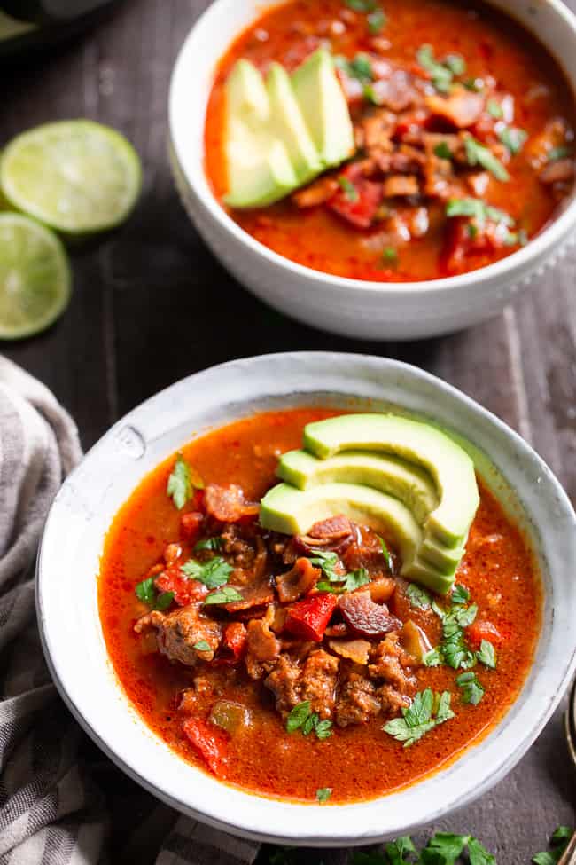 This easy instant pot beef chili is packed with everything you’re craving!  Savory ground beef and bacon, peppers, onions and garlic and the perfect spices.  It’s paleo, dairy-free, Whole30 compliant and keto friendly, delicious and family approved! Paleo dinner. Paleo recipes. Whole30 dinner. Whole30 chili. Keto recipes.