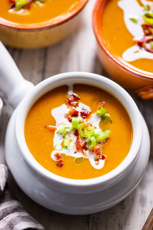 This Paleo and Whole30 butternut squash soup is creamy, sweet and savory!  It’s made simple and fast in the Instant Pot for a quick healthy comforting meal. Bacon and apples lend sweet and smoky flavor to this fall and winter family favorite.  Paleo soup.  Paleo dinner.  Paleo instant pot.