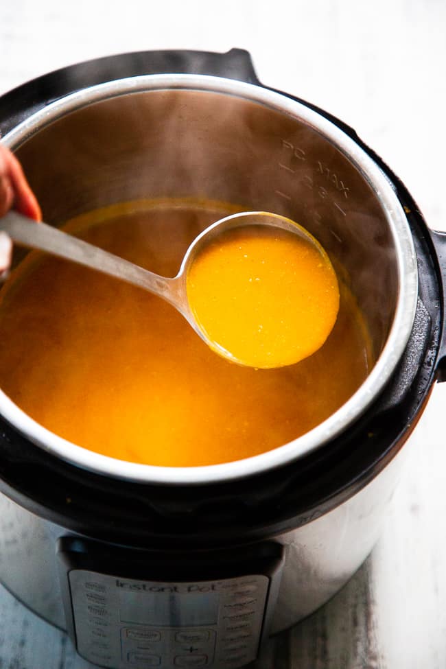 This Paleo and Whole30 butternut squash soup is creamy, sweet and savory!  It’s made simple and fast in the Instant Pot for a quick healthy comforting meal. Bacon and apples lend sweet and smoky flavor to this fall and winter family favorite.  Paleo soup.  Paleo dinner.  Paleo instant pot.