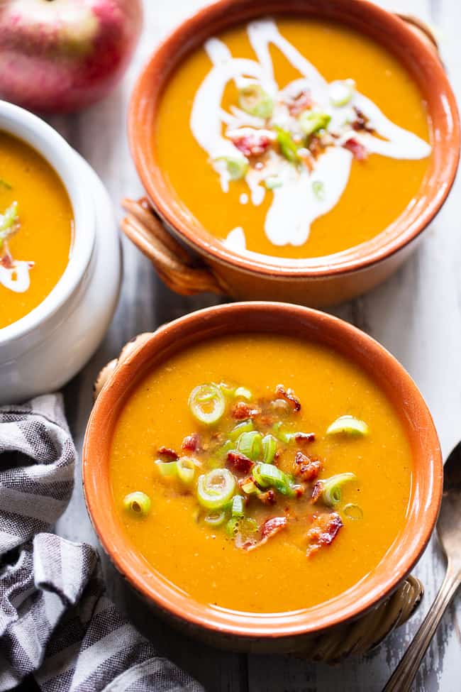 This Paleo and Whole30 butternut squash soup is creamy, sweet and savory!  It’s made simple and fast in the Instant Pot for a quick healthy comforting meal. Bacon and apples lend sweet and smoky flavor to this fall and winter family favorite.  Paleo soup.  Paleo dinner.  Paleo instant pot.