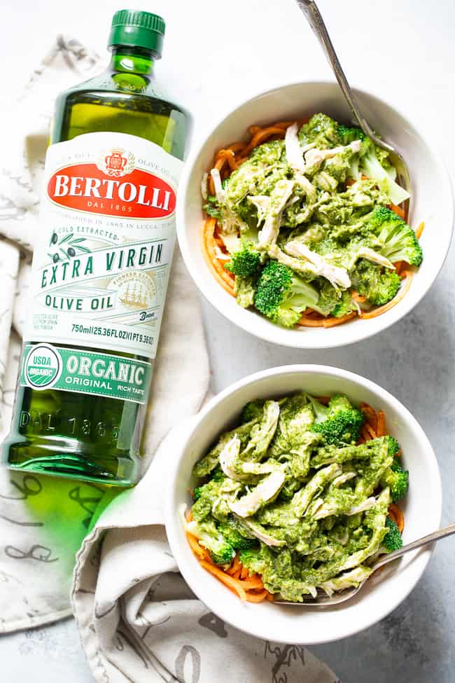 [This paleo and Whole30 pesto chicken with broccoli and sweet potato noodles is packed with flavor and super simple to prepare.  It’s perfect for weeknight dinners and date nights alike!  An easy and fun paleo dinner!] #Bertolli #TheRecipeIsSimple #evoo #QualityOliveOil and #ad