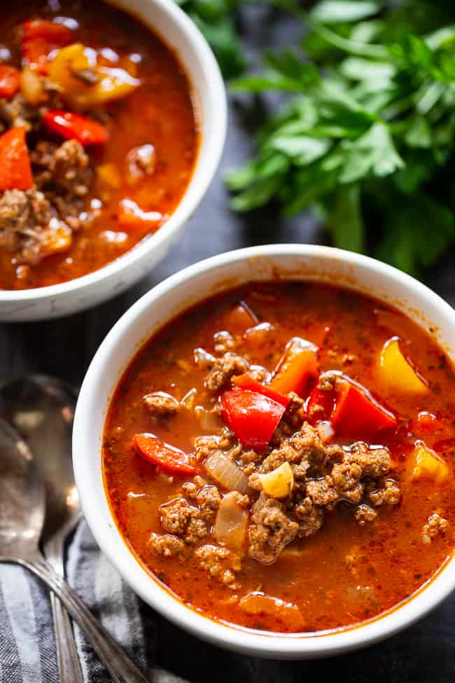 This stuffed pepper soup is loaded with everything you’re craving!  Italian spices, savory ground beef, garlic and onions, bell peppers, and cauliflower “rice” make this a hearty soup that’s also super healthy for you.  Gluten-free, dairy-free, keto and Whole30 friendly.