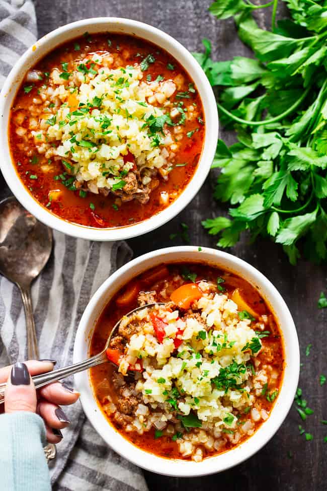 This stuffed pepper soup is loaded with everything you’re craving!  Italian spices, savory ground beef, garlic and onions, bell peppers, and cauliflower “rice” make this a hearty soup that’s also super healthy for you.  Gluten-free, dairy-free, keto and Whole30 friendly.