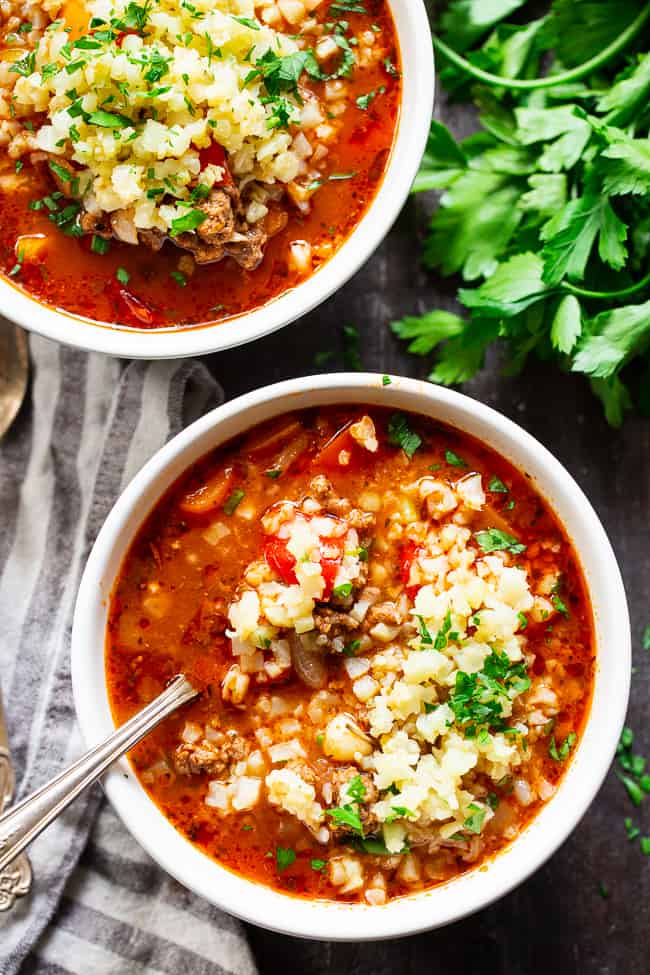 This stuffed pepper soup is loaded with everything you’re craving!  Italian spices, savory ground beef, garlic and onions, bell peppers, and cauliflower “rice” make this a hearty soup that’s also super healthy for you.  Gluten-free, dairy-free, keto and Whole30 friendly.