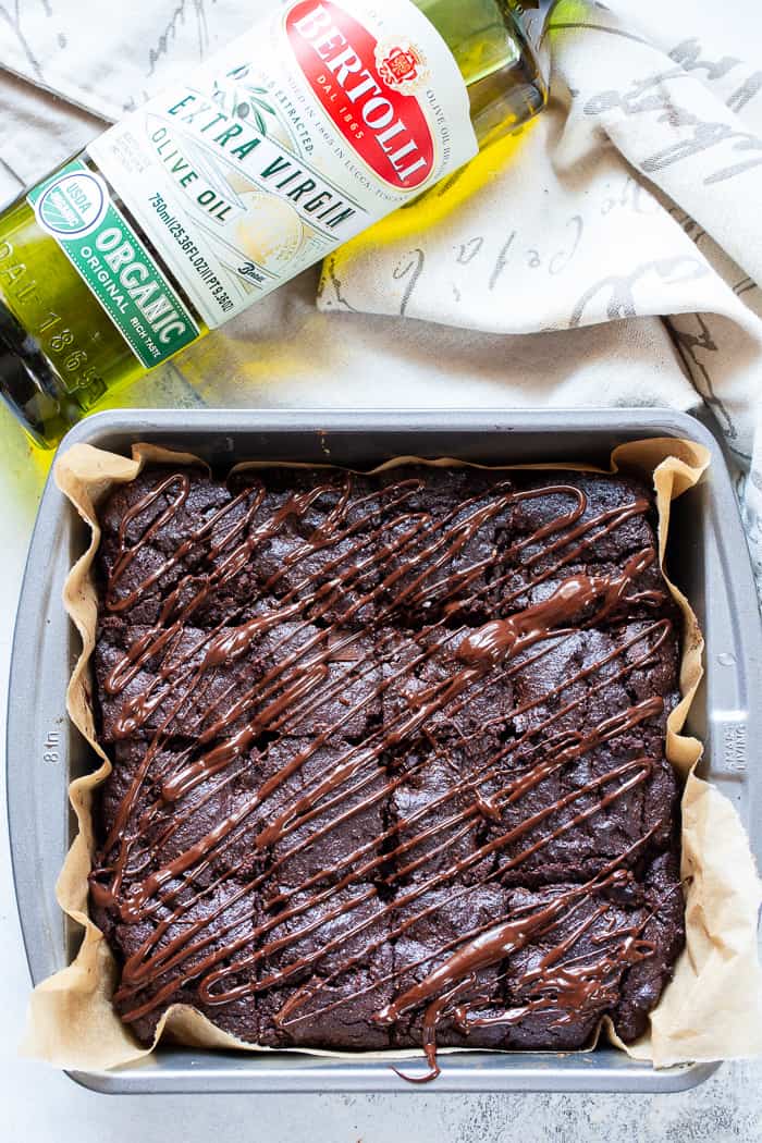 These triple chocolate olive oil brownies are made with no flour, refined sugar or butter and have a deep, rich flavor and texture thanks to Bertolli Organic Extra Virgin Olive Oil and quality chocolate. They’re grain free, dairy-free, and paleo.  #Bertolli #TheRecipeIsSimple #evoo #QualityOliveOil #ad