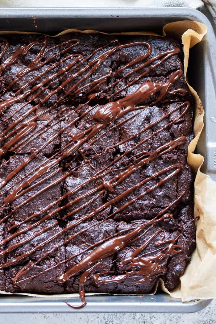 These triple chocolate olive oil brownies are made with no flour, refined sugar or butter and have a deep, rich flavor and texture thanks to Bertolli Organic Extra Virgin Olive Oil and quality chocolate. They’re grain free, dairy-free, and paleo.  #Bertolli #TheRecipeIsSimple #evoo #QualityOliveOil #ad