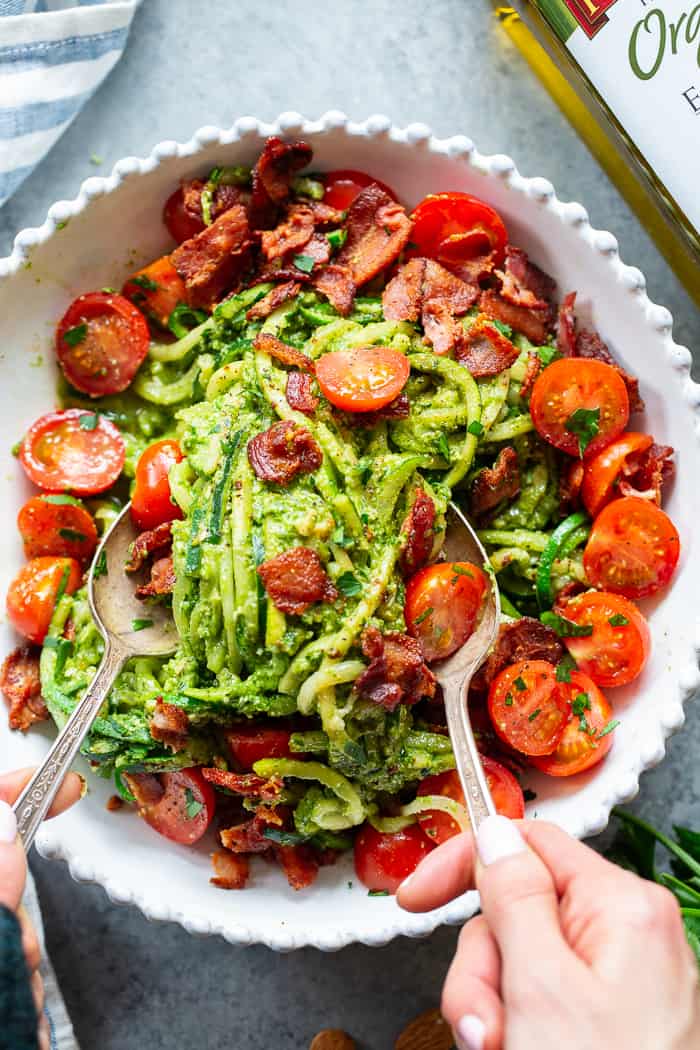 These BLT Pesto Zoodles are packed with savory flavor and crunch! An easy basil pesto plus crispy bacon and tomatoes make these zoodles a favorite for everyone in the family. Gluten-free, dairy-free and Whole30 options, and keto friendly. #AD @Pompeian #pompeian