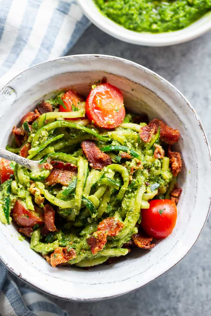 These BLT Pesto Zoodles are packed with savory flavor and crunch! An easy basil pesto plus crispy bacon and tomatoes make these zoodles a favorite for everyone in the family. Gluten-free, dairy-free and Whole30 options, and keto friendly. #AD @Pompeian #pompeian