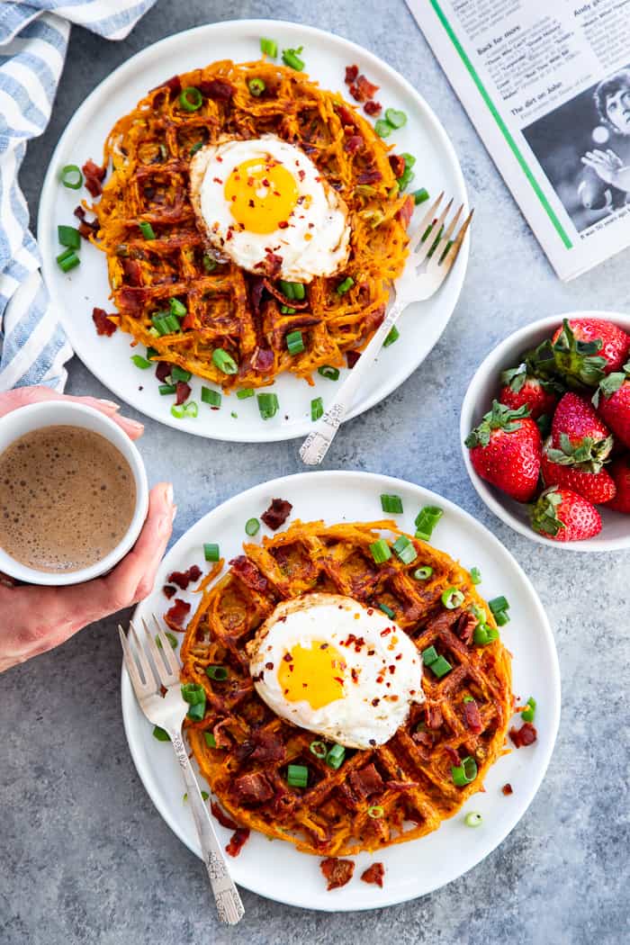 These savory bacon and sweet potato waffles are crisp on the outside, packed with tons of flavor and a fun weekend breakfast or brunch!  Top them with fried eggs and more crispy bacon for a super tasty, filling, wholesome meal that you’ll want to make again and again!  Paleo and Whole30 friendly. #AD @JonesDairyFarm #JonesDairyFarm