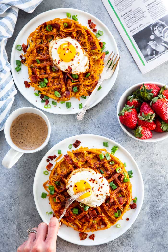 These savory bacon and sweet potato waffles are crisp on the outside, packed with tons of flavor and a fun weekend breakfast or brunch!  Top them with fried eggs and more crispy bacon for a super tasty, filling, wholesome meal that you’ll want to make again and again!  Paleo and Whole30 friendly. #AD @JonesDairyFarm #jonesdairyfarm