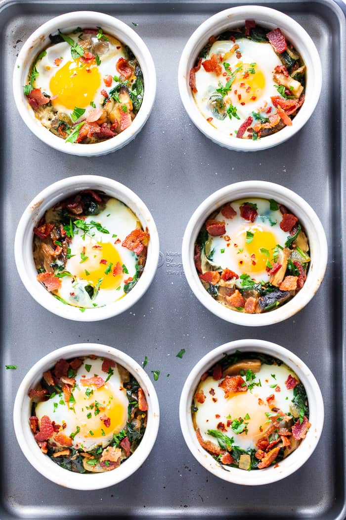 Made in single serving ramekins, these baked eggs are packed with savory goodies and flavor!   Great for weekend brunches and make-ahead friendly for weekdays.  Paleo, Whole30 compliant and keto friendly.
