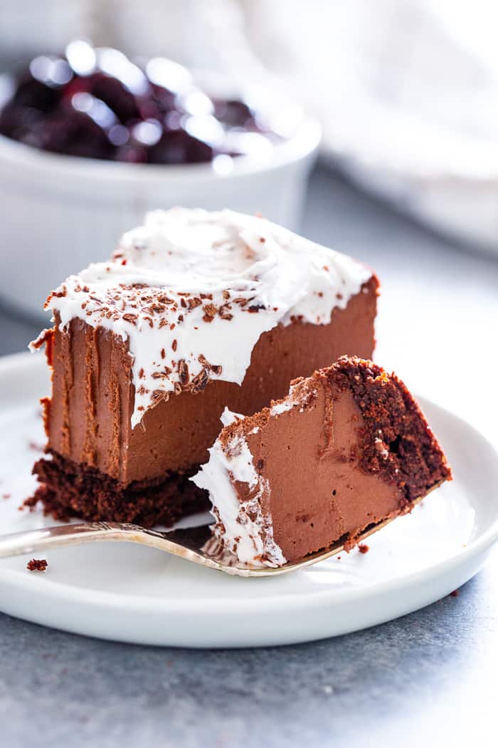 Get excited, because the creamiest, smoothest, richest vegan chocolate cheesecake is about to happen in your kitchen!  This cheesecake has a chocolate cookie crust with a cashew and coconut cream based chocolate filling that tastes like a traditional cheesecake.  It’s paleo, gluten-free, vegan, and refined sugar free.