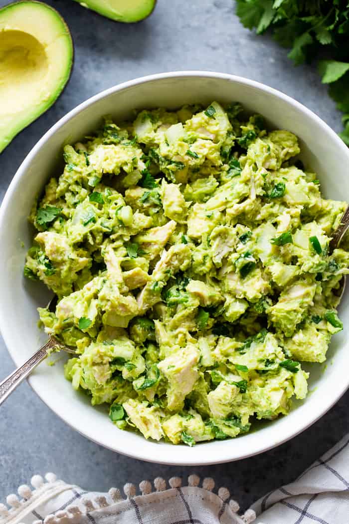 Since guacamole and chicken salad are two of our favorite things, I decided it was time to combine them!  This guacamole chicken salad is mayo-free, packed with flavor, protein, and perfect for easy lunches!  It’s paleo, Whole30 compliant and keto friendly, too.